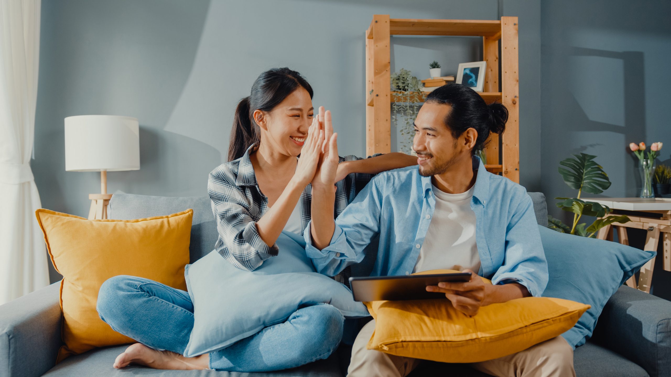 Couple high fiving