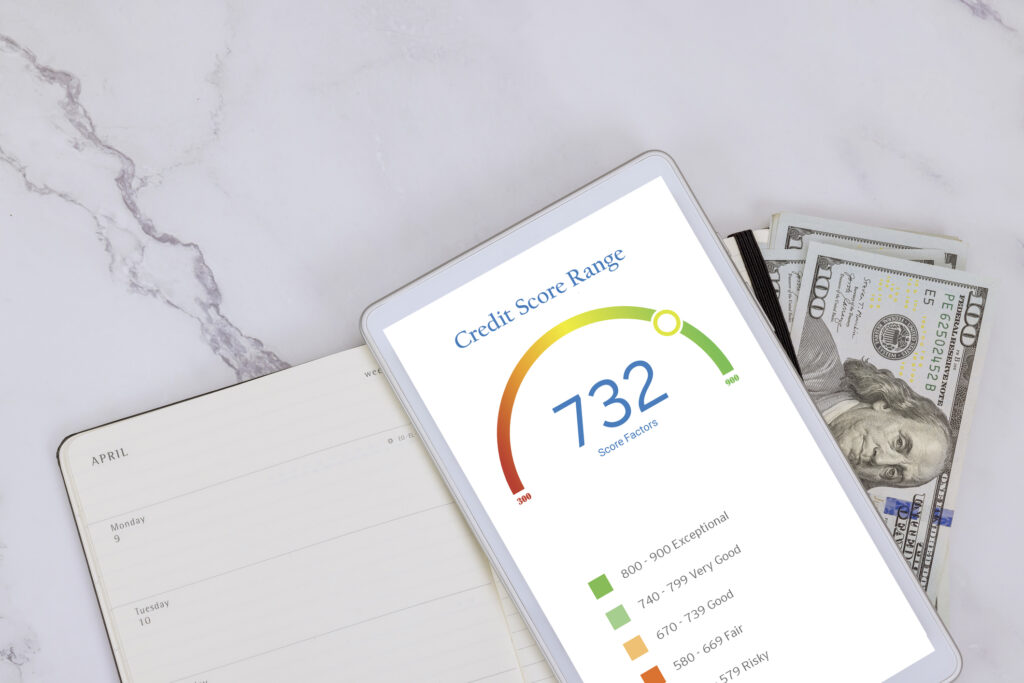 credit score range. Using digital tablet to check your work account online documents is best way check your credit score