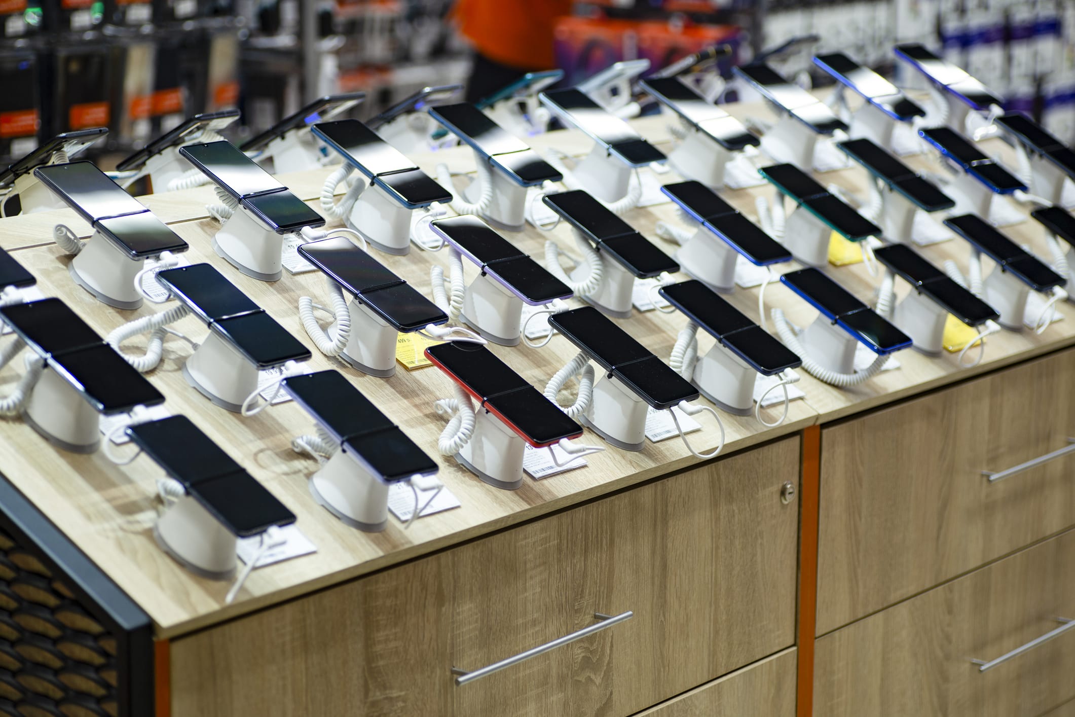 cell phone plans rows of phones in store