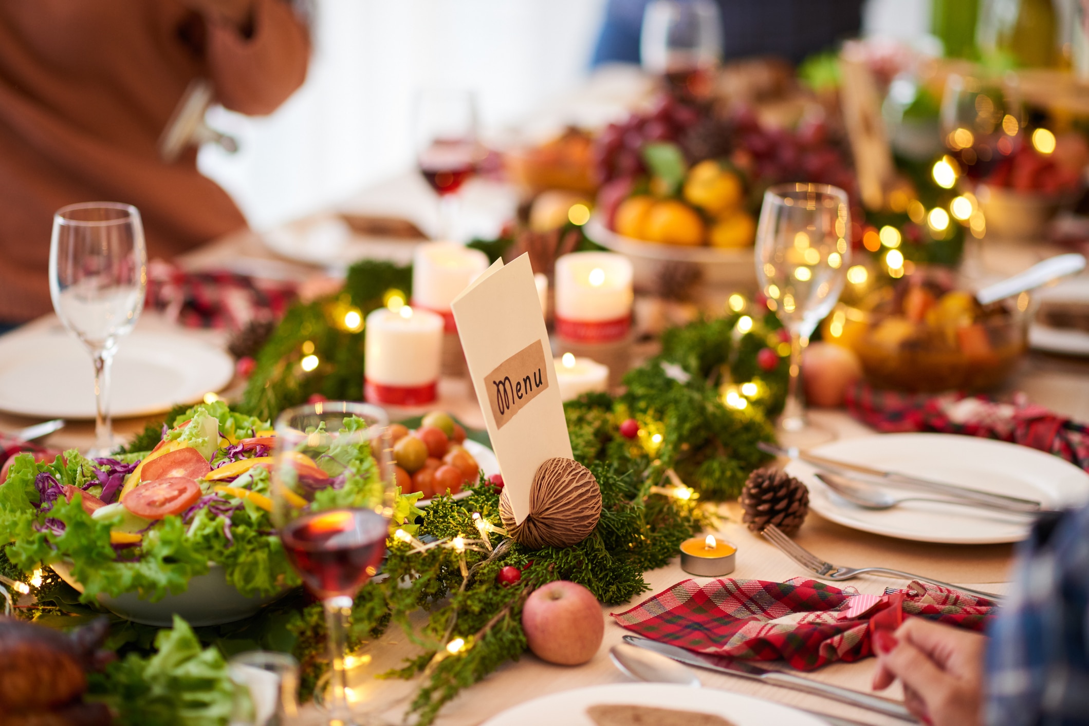 an affordable holiday meal on a decorated Christmas table